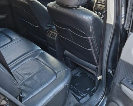 Черный Ниссан ИксТрейл, объемом двигателя 2.5 л и пробегом 340 тыс. км за 7299 $, фото 7 на Automoto.ua