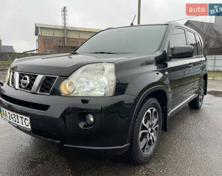 Черный Ниссан ИксТрейл, объемом двигателя 2 л и пробегом 210 тыс. км за 8750 $, фото 4 на Automoto.ua