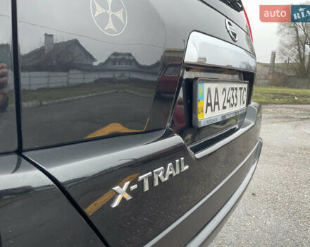 Черный Ниссан ИксТрейл, объемом двигателя 2 л и пробегом 210 тыс. км за 8750 $, фото 44 на Automoto.ua