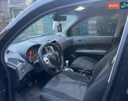 Черный Ниссан ИксТрейл, объемом двигателя 2.5 л и пробегом 236 тыс. км за 8600 $, фото 10 на Automoto.ua