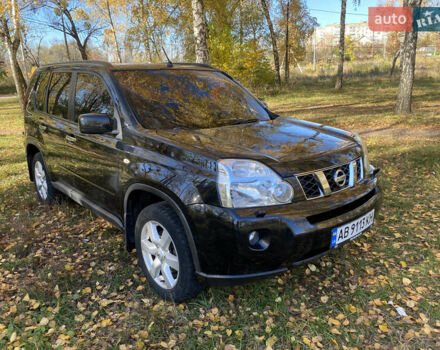 Черный Ниссан ИксТрейл, объемом двигателя 2 л и пробегом 214 тыс. км за 11500 $, фото 1 на Automoto.ua