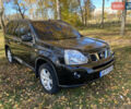 Черный Ниссан ИксТрейл, объемом двигателя 2 л и пробегом 214 тыс. км за 11500 $, фото 1 на Automoto.ua