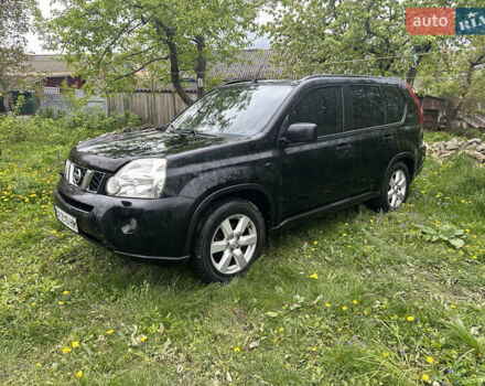 Черный Ниссан ИксТрейл, объемом двигателя 2 л и пробегом 260 тыс. км за 9300 $, фото 1 на Automoto.ua