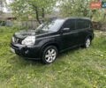 Черный Ниссан ИксТрейл, объемом двигателя 2 л и пробегом 260 тыс. км за 9300 $, фото 1 на Automoto.ua