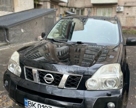 Чорний Ніссан ІксТрейл, об'ємом двигуна 2 л та пробігом 305 тис. км за 4299 $, фото 2 на Automoto.ua