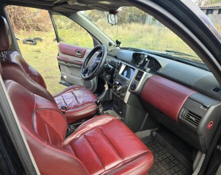 Черный Ниссан ИксТрейл, объемом двигателя 2.2 л и пробегом 206 тыс. км за 4000 $, фото 9 на Automoto.ua