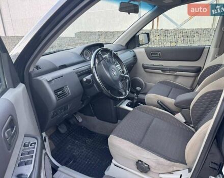 Чорний Ніссан ІксТрейл, об'ємом двигуна 2.2 л та пробігом 295 тис. км за 3850 $, фото 6 на Automoto.ua