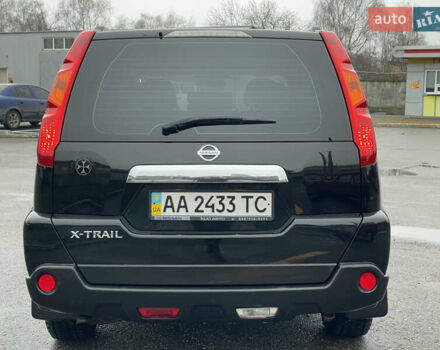 Черный Ниссан ИксТрейл, объемом двигателя 2 л и пробегом 210 тыс. км за 8750 $, фото 9 на Automoto.ua