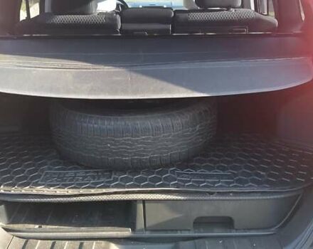 Черный Ниссан ИксТрейл, объемом двигателя 2 л и пробегом 182 тыс. км за 9300 $, фото 4 на Automoto.ua