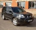 Черный Ниссан ИксТрейл, объемом двигателя 2 л и пробегом 240 тыс. км за 9700 $, фото 1 на Automoto.ua