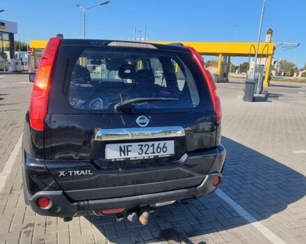 Черный Ниссан ИксТрейл, объемом двигателя 2 л и пробегом 310 тыс. км за 6700 $, фото 4 на Automoto.ua