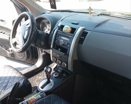 Черный Ниссан ИксТрейл, объемом двигателя 2 л и пробегом 192 тыс. км за 9500 $, фото 10 на Automoto.ua