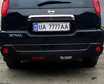 Черный Ниссан ИксТрейл, объемом двигателя 2 л и пробегом 205 тыс. км за 7800 $, фото 1 на Automoto.ua