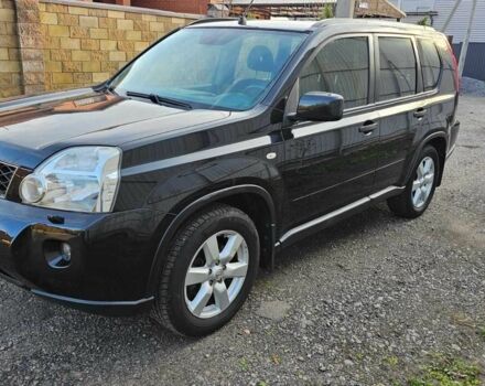 Черный Ниссан ИксТрейл, объемом двигателя 2 л и пробегом 230 тыс. км за 9000 $, фото 4 на Automoto.ua