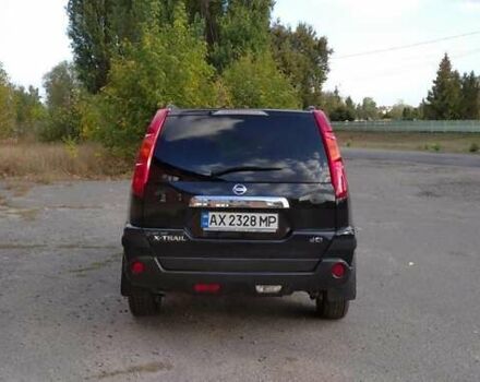 Черный Ниссан ИксТрейл, объемом двигателя 2 л и пробегом 240 тыс. км за 9700 $, фото 2 на Automoto.ua