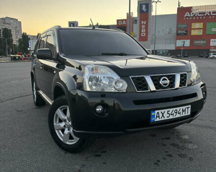 Черный Ниссан ИксТрейл, объемом двигателя 2 л и пробегом 305 тыс. км за 10700 $, фото 7 на Automoto.ua