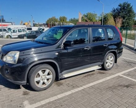 Черный Ниссан ИксТрейл, объемом двигателя 2 л и пробегом 310 тыс. км за 6700 $, фото 1 на Automoto.ua