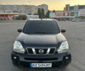 Черный Ниссан ИксТрейл, объемом двигателя 2 л и пробегом 305 тыс. км за 10700 $, фото 3 на Automoto.ua