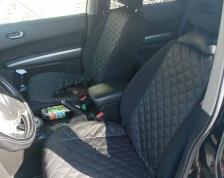 Черный Ниссан ИксТрейл, объемом двигателя 2 л и пробегом 192 тыс. км за 9500 $, фото 1 на Automoto.ua