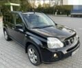 Черный Ниссан ИксТрейл, объемом двигателя 2 л и пробегом 244 тыс. км за 8298 $, фото 4 на Automoto.ua