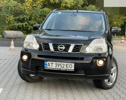 Черный Ниссан ИксТрейл, объемом двигателя 2 л и пробегом 242 тыс. км за 9300 $, фото 1 на Automoto.ua