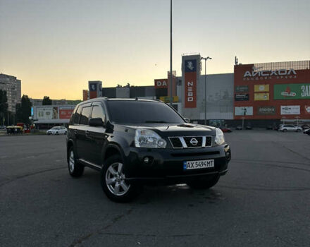 Черный Ниссан ИксТрейл, объемом двигателя 2 л и пробегом 305 тыс. км за 10700 $, фото 2 на Automoto.ua