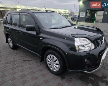 Черный Ниссан ИксТрейл, объемом двигателя 2 л и пробегом 200 тыс. км за 10300 $, фото 1 на Automoto.ua