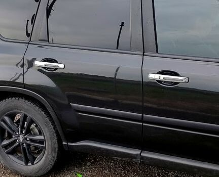 Черный Ниссан ИксТрейл, объемом двигателя 2 л и пробегом 205 тыс. км за 7800 $, фото 3 на Automoto.ua