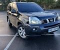 Черный Ниссан ИксТрейл, объемом двигателя 2 л и пробегом 284 тыс. км за 8500 $, фото 1 на Automoto.ua