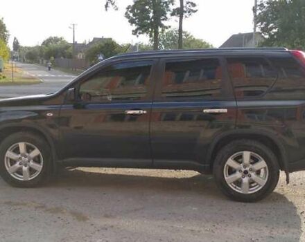 Черный Ниссан ИксТрейл, объемом двигателя 2 л и пробегом 240 тыс. км за 9700 $, фото 5 на Automoto.ua