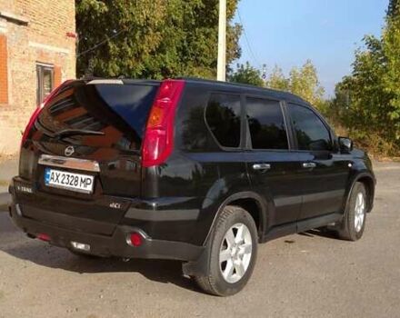 Черный Ниссан ИксТрейл, объемом двигателя 2 л и пробегом 240 тыс. км за 9700 $, фото 4 на Automoto.ua