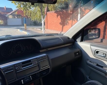 Черный Ниссан ИксТрейл, объемом двигателя 2 л и пробегом 200 тыс. км за 2950 $, фото 7 на Automoto.ua