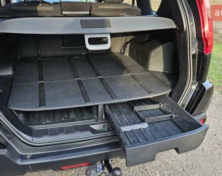 Черный Ниссан ИксТрейл, объемом двигателя 2 л и пробегом 230 тыс. км за 9000 $, фото 9 на Automoto.ua