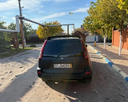 Черный Ниссан ИксТрейл, объемом двигателя 2 л и пробегом 200 тыс. км за 2950 $, фото 2 на Automoto.ua