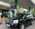 Черный Ниссан ИксТрейл, объемом двигателя 2 л и пробегом 305 тыс. км за 9800 $, фото 1 на Automoto.ua