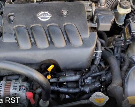 Черный Ниссан ИксТрейл, объемом двигателя 2 л и пробегом 205 тыс. км за 7800 $, фото 4 на Automoto.ua