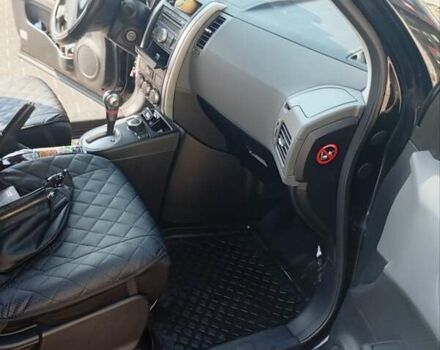 Черный Ниссан ИксТрейл, объемом двигателя 2 л и пробегом 192 тыс. км за 9500 $, фото 5 на Automoto.ua