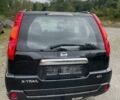 Черный Ниссан ИксТрейл, объемом двигателя 2 л и пробегом 250 тыс. км за 9800 $, фото 2 на Automoto.ua