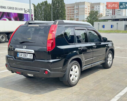 Чорний Ніссан ІксТрейл, об'ємом двигуна 2 л та пробігом 165 тис. км за 9200 $, фото 2 на Automoto.ua