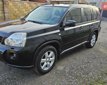 Черный Ниссан ИксТрейл, объемом двигателя 2 л и пробегом 230 тыс. км за 9000 $, фото 1 на Automoto.ua