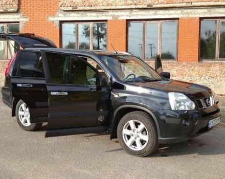 Черный Ниссан ИксТрейл, объемом двигателя 2 л и пробегом 240 тыс. км за 9700 $, фото 16 на Automoto.ua