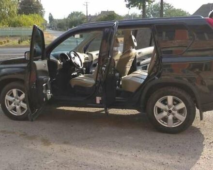 Черный Ниссан ИксТрейл, объемом двигателя 2 л и пробегом 240 тыс. км за 9700 $, фото 20 на Automoto.ua