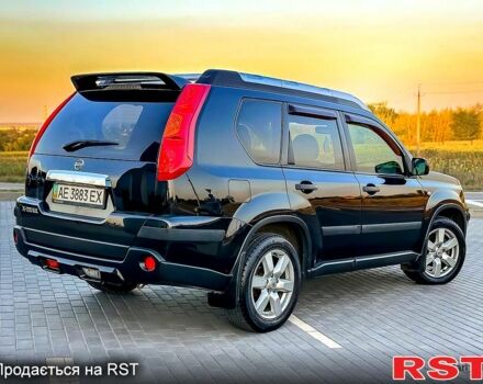 Черный Ниссан ИксТрейл, объемом двигателя 2 л и пробегом 227 тыс. км за 8300 $, фото 2 на Automoto.ua