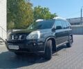 Черный Ниссан ИксТрейл, объемом двигателя 2 л и пробегом 192 тыс. км за 9500 $, фото 1 на Automoto.ua