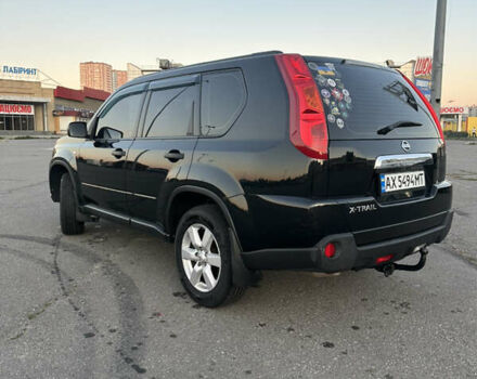 Черный Ниссан ИксТрейл, объемом двигателя 2 л и пробегом 305 тыс. км за 10700 $, фото 4 на Automoto.ua