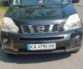 Черный Ниссан ИксТрейл, объемом двигателя 2.5 л и пробегом 170 тыс. км за 11000 $, фото 2 на Automoto.ua