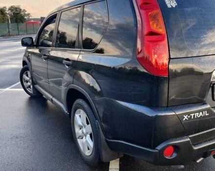 Черный Ниссан ИксТрейл, объемом двигателя 2 л и пробегом 284 тыс. км за 8500 $, фото 3 на Automoto.ua