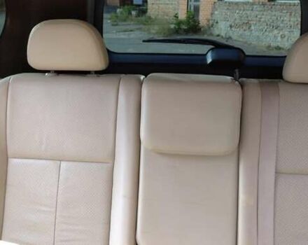 Черный Ниссан ИксТрейл, объемом двигателя 2 л и пробегом 240 тыс. км за 9700 $, фото 10 на Automoto.ua