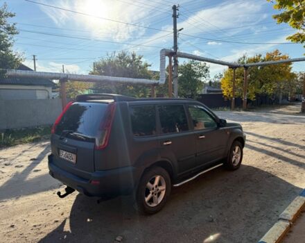 Черный Ниссан ИксТрейл, объемом двигателя 2 л и пробегом 200 тыс. км за 2950 $, фото 1 на Automoto.ua