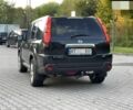 Черный Ниссан ИксТрейл, объемом двигателя 2 л и пробегом 244 тыс. км за 8298 $, фото 1 на Automoto.ua